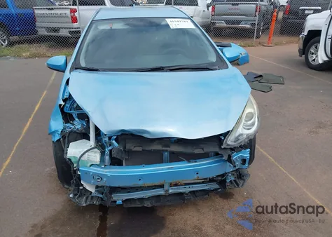 2015 Toyota Prius C Four/One/Three/Two from USA, damaged, VIN JTDKDTB37F1109905